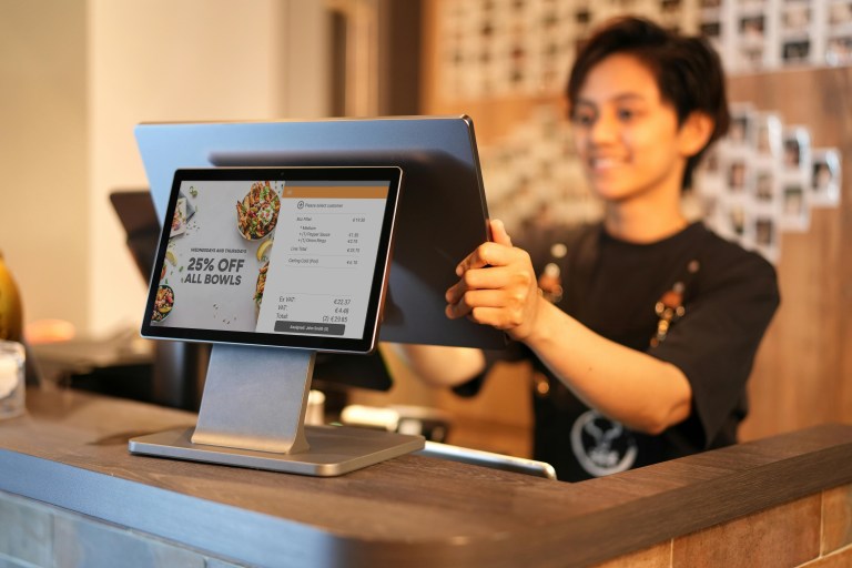 Restaurant staff using EPOS D3 PRO dual-display payment system Ireland