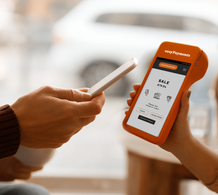 Customer making contactless payment on PAX A920 PRO terminal showing modern payment solutions UK businesses use for digital wallet transactions